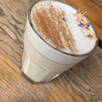 Very pretty chai with oat milk 💚  at A Little Lost in Munich