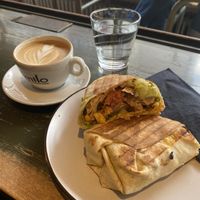 Vegan burrito and cappuccino. 5/5! 💚🌱  at A Little Lost in Munich