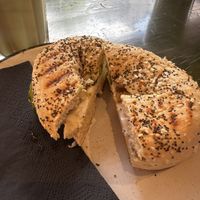 Creme cheese bagel with cucumber and caramelized sunflower seeds  at A Little Lost in Munich