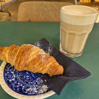 Croissant and oat latte at A Little Lost in Munich