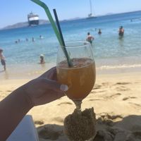  Cocktail weighed down by sand   at Saint Stefanos Cafe - Snack Bar and Grill in Mykonos