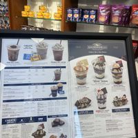 Various Offerings w/Chocolates in the Background  at Ghirardelli Ice Cream and Chocolate Factory Outlet in San Leandro