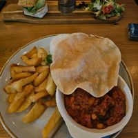 Vegan polenta burger - Vegan spiced butternut squash curry. at The Townhouse.211 in Barrow-in-furness