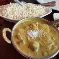 Curry with rice, coconut garnish  at Cafe Lotus in Fairfax