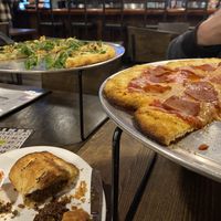Walnut meat pie, bush tukka pizza, and pepperoni pizza.  at Drop Bear Brewery in Eugene