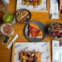 Focaccia, not-avocadk toast, yogurt bowls, peanut butter toast, latte and matcha at GIARDÍ  in Milan