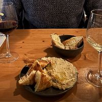 Bread & olive oil and focaccia & hummus.  at GIARDÍ  in Milan