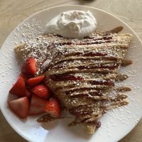 Pb&j with banana and strawberries +coco whip  at Brown Butter Crêperie and Café in Grand Rapids
