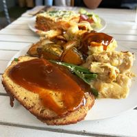 Christmas dinner plate: vegan roast, stuffing, creamy cauliflower, roasted veggies, garlic green beans, potato mash, gravy.  at Mama B's in Chippendale