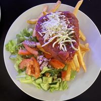 Chiken parmigiana with chips & salad  at Mama B's in Chippendale