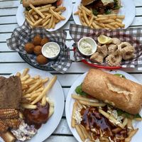 Steak sandwich, cauliflower burger, fried chick’n plate, salt and pepper kalamari, and pumpkin arancini fried   at Mama B's in Chippendale