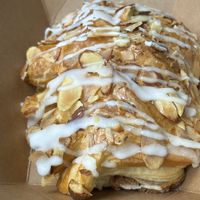 Vegan almond Croissant   at Burnt Umber Coffee ft. Petals & Poison Tea Room in Garden Grove
