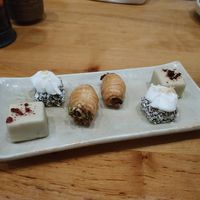 White chocolate with orange. Chocolate with coconot and pistachio filled pastry at Laurel in Budapest