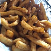 Micro fries bathed in salt. 1st batch cold. Second inedible  at Trident Bookstore and Cafe in Boston