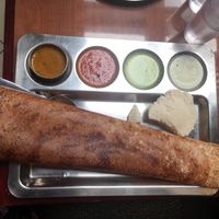 Masala Dosa (has potato on the inside) and Idli (the round white rice patty) at Saravana Bhavan in Fremont