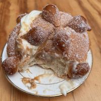 Amor muerto lotus. 
Pancito de muerto, bañado en 3 leches apv, quesito crema endulzado, hilos de crema biscoff y galleta Lotus.  at La Dulzura in Mexico City