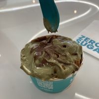 Chocolate ice cream with pistachio sauce and crushed caramelised biscuits   at Yolé Cafe - Chinatown in Central Singapore