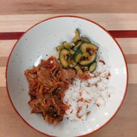 chk'n pieces with terayaki sauci, marinated cucumber and rice at Bar Madam in Antwerpen