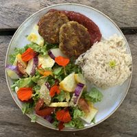 menu of the day, coconut rice; soy patty with pumpkin; salad from the garden + banana cake with coconut  at Cocina La Itinerante  in El Carmen De Viboral