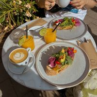 Vegan avocado toast, oat milk cappuccino & fresh orange juice
 at Pip Deli in Haarlem