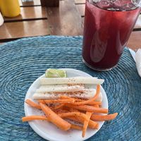 Jícama y zanahoria de entrada gratis  at Ten Ten Pie Al Carbon in San Miguel De Allende
