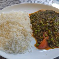 Curry with peas, tomatoes and spinach at Grüne Oase in Trier