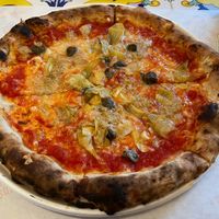 Vegan Pizza Capri (Tuna, capers, artichokes, cheese)  at Bottega di Rosaria in Siena