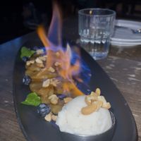 Flaming pineapple w ice cream dessert! #Veganuary at The Raven Room in Whistler
