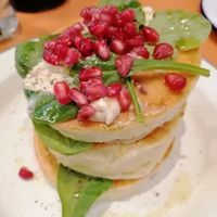 Hummus spinach and pomegranate seeds at Madam Pancake in Amsterdam