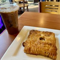 Vegan sausage n egg handpie with iced soy lattee  at Loons Coffee in Minneapolis