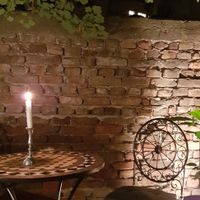 Romantic outdoor seating at Radost Fina Kuhinjica in Belgrade