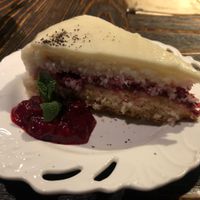 Vegan white chocolate cake with coconut and raspberries  at Radost Fina Kuhinjica in Belgrade