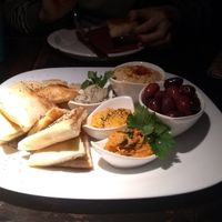 Starter with hummus, olives, pita bread, Baba ganoush and other two sauces at Radost Fina Kuhinjica in Belgrade