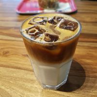 Ice cold brew oat latte at Boreal Coffee Shop - Stand in Geneva