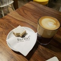 Raw coconut treat & almond latte at Boreal Coffee Shop - Stand in Geneva