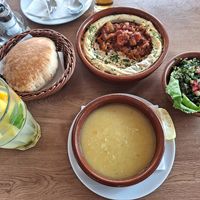 Hummus with eggplant, tebula salad and lentil soup at Trója in Szeged