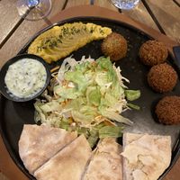 Falafel with hummus, pita bread, salad and tzatziki sauce. Delicious!  at VALA in Fazana