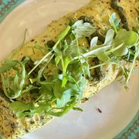 Cheese Omelette with pesto   at Unicorniverse Bakery & Cafe in Round Rock