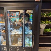 Fridge with fresh ingredients at Shū Shí NánHái 2 舒食男孩 in Chishang