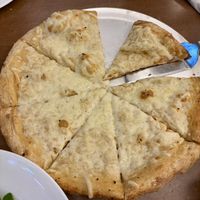 Medium garlic and Olive oil base with vegan cheesee  at Mellow Mushroom in Cary