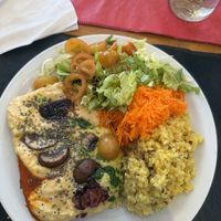 Milanesa de Garbanzo with vegan cheese and salad  at Vegetariana in Buenos Aires