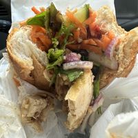 Half eaten lemon grass tofu roll  at Trang Bakery & Cafe in South Yarra