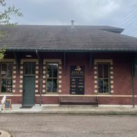 Exterior of the former train depot where the restaurant is located.  at Crystal's Zen and Juice in Jackson