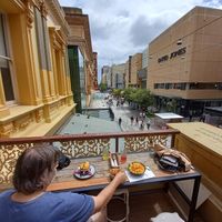 Warm arvo balcony dining at Two-Bit Villains in Adelaide