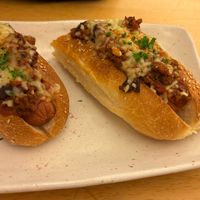 Chilli dog w vegan cheesee  at Two-Bit Villains in Adelaide