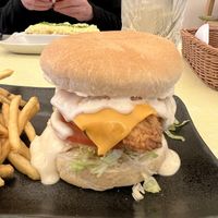 The Jailbird - 
'Buttermilk fried chicken' (soy, gluten), lettuce, tomato, cheese with housemade aioli (and vegan cheese)    at Two-Bit Villains in Adelaide