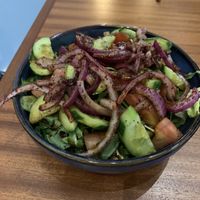 House salad with pomegranate vinaigrette. The pomegranate vinaigrette was too tart (like pure pomegranate syrup/molasses) and wasn’t very good; maybe get a lemon/olive dressing   at Meze Moon in Chico