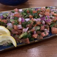 Shirazi salad special — quite good! Tomatoes, cucumber, onions (a lot!) with with herbs and lemon/olive oil dressing.   at Meze Moon in Chico