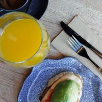 Toast with hummus, avocado and tomato at GRONX Zurriola in San Sebastian