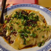 Wonton dumplings in chilli oil at Regina Bar in Warsaw